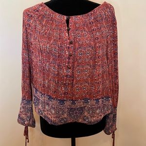 Lucky Brand pullover with elastic wrist and waist. Functional brass buttons